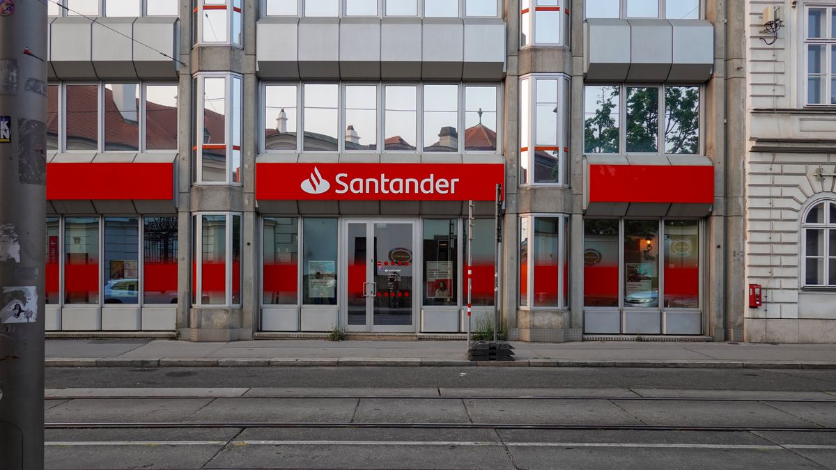 Santander Bank Branch
The entrance to a Santander Bank branch with full branding and signage is visible along a tram-lined street in Vienna, Austria, on June 9, 2025. (Photo by Michael Nguyen/NurPhoto via Getty Images)
NurPhoto
austrian building, economic recession, austria office, european corporate, european banking, austria economy, austrian institution, austrian economy, austria institution, european architecture, austria commerce, economic slowdown, european business, austrian capital, austria retail, austria bank, austria street, europe finance, austrian urban, austria city, europe spending habits, austria modern, europe financial institution, austria capital, austria facade, european bank, austrian finance, europe economy news, austria finance, europe structure, austrian bank, european brand, austrian signage, economic slump, austria transport, european company, austria business, austrian office, economic downturn, economy europe, austrian infrastructure, europe signage, consumption, european design, austria tram line, europe inflation