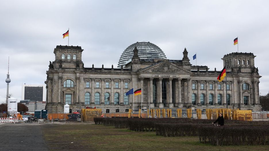 German Federal Election
A view of the Reichstag building during the German federal election in Berlin, Germany on February 23, 2025. (Photo by Jakub Porzycki/NurPhoto via Getty Images)
NurPhoto
legislative building, voter turnout, flags, election day, landmark, political representation, federal government, jakub porzycki, german democracy., entrance, election results, democratic process, political event, political landscape, national election, parliament, building, german federal election, parliamentary, nurphoto, elections, february 23, german parliament, political candidates, reichstag building, european politics, civic engagement, electoral system, political process, political parties, federal, german