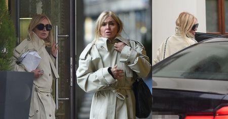Monika Olejnik przekracza wrota ekskluzywnego butiku w deszczowy dzień z PRZECIWSŁONECZNYMI okularami na nosie (ZDJĘCIA)