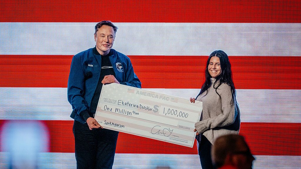 Elon Musk Speaks At America PAC Town Hall Ahead Of Wisconsin Supreme Court Election
Elon Musk, chief executive officer of Tesla Inc., left, presents a one million dollar check to an attendee during an America PAC town hall ahead of the Wisconsin Supreme Court election at the KI Convention Center in Green Bay, Wisconsin, US, on Sunday, March 30, 2025. Musk's plan to hand out $1 million checks to two residents for participating in Wisconsin's Supreme Court election is barred by state law, a new complaint said Friday. Photographer: Jamie Kelter Davis/Bloomberg via Getty Images
Bloomberg
judge, north american, wisconsin supreme court, judiciary, elections, us, united states of america, americas, government news, 2025uspolitics, best photos, u.s.a., american, best photo, u.s. government