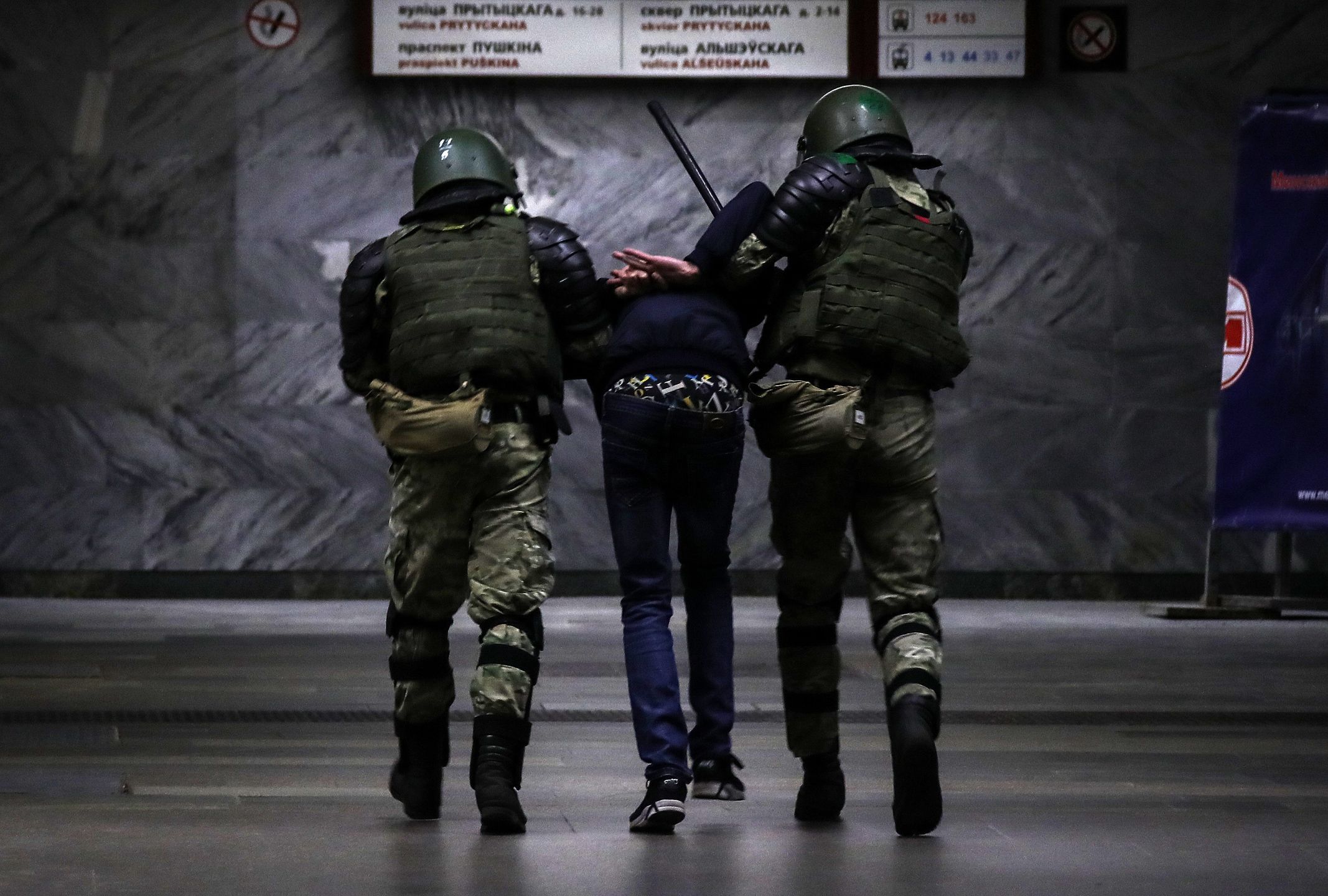 MINSK, BELARUS - AUGUST 11, 2020: Belarusian law enforcement officers escort a participant in a protest against the results of the 2020 Belarusian presidential election. Mass protests erupted in major cities across Belarus in the evening of August 9. Valery Sharifulin/TASS