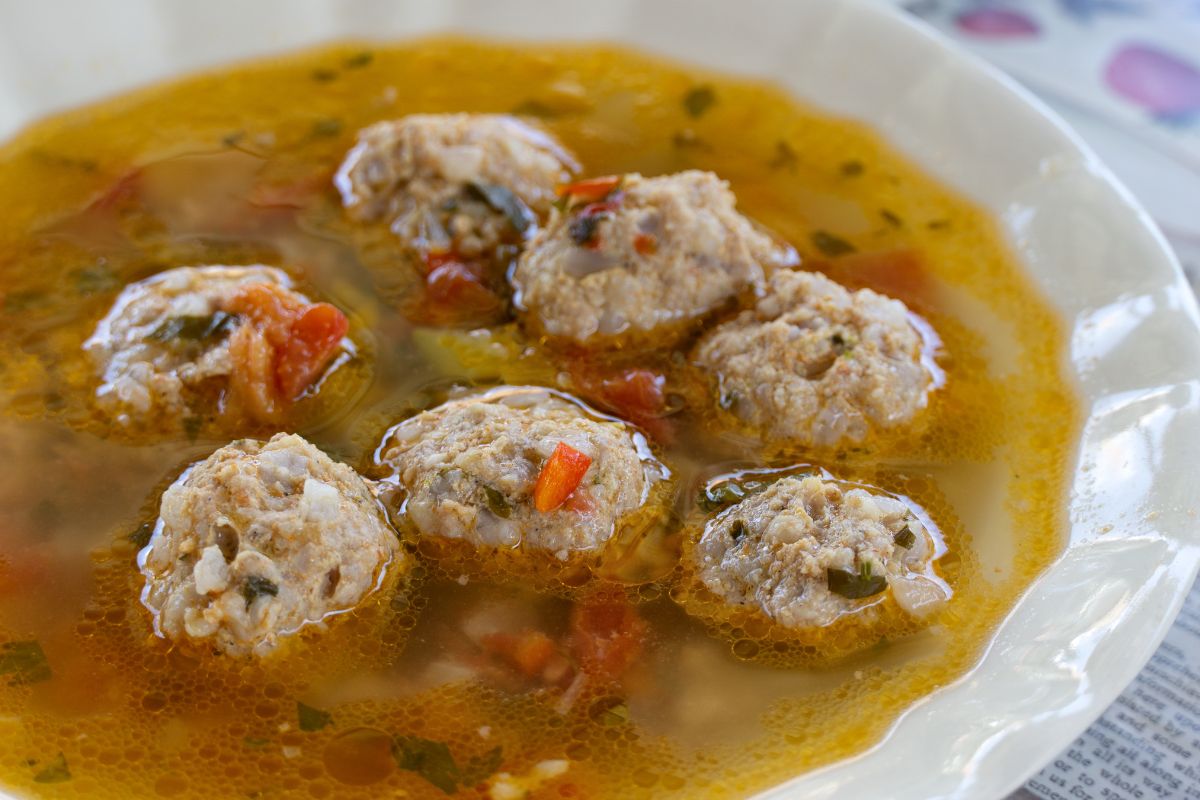 Ciorba can also be served with pork meatballs.