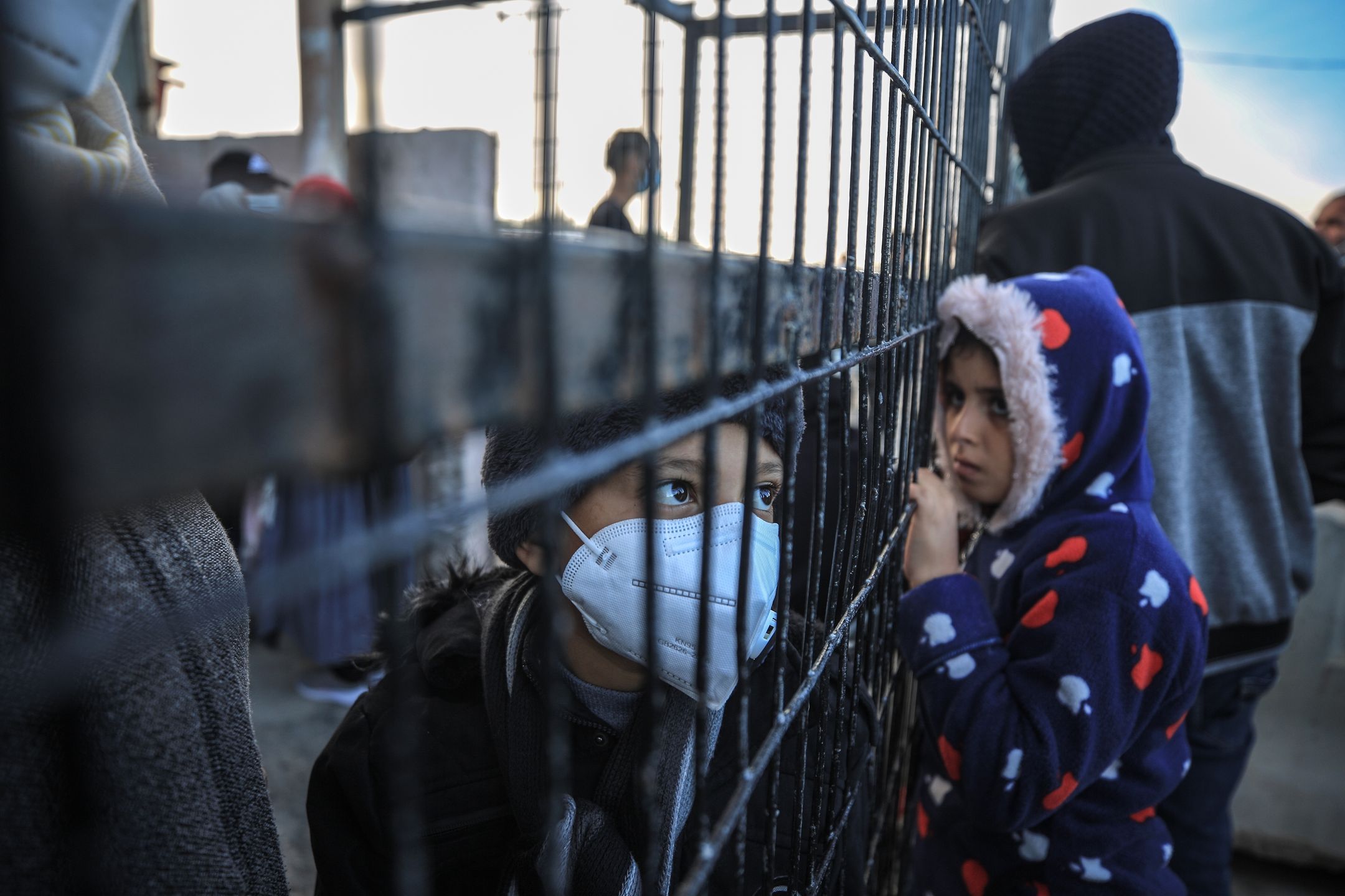 RAFAH, GAZA - NOVEMBER 24: Palestinians wait with their luggage to cross the border after Egypt exceptionally opened the Rafah border crossing with the Gaza Strip for three consecutive days in both directions, in Rafah, Gaza on November 24, 2020. (Photo by Ali Jadallah/Anadolu Agency via Getty Images)