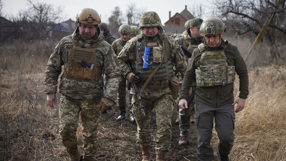 TemporaryIn this handout photo provided by the Ukrainian Presidential Press Office, Ukrainian President Volodymyr Zelenskyy, right, pays a visit to the front line in Donetsk region, eastern Ukraine, Thursday, Feb. 17, 2022. U.S. Secretary of State Antony Blinken told ABC News that Russian President Vladimir Putin "can pull the trigger. He can pull it today. He can pull it tomorrow. He can pull it next week. The forces are there if he wants to renew aggression against Ukraine." NATO Secretary-General Jens Stoltenberg and Ukrainian President Volodymyr Zelenskyy also dismissed the Russian claims. (Ukrainian Presidential Press Office via AP)Ukrainian Presidential Press Office