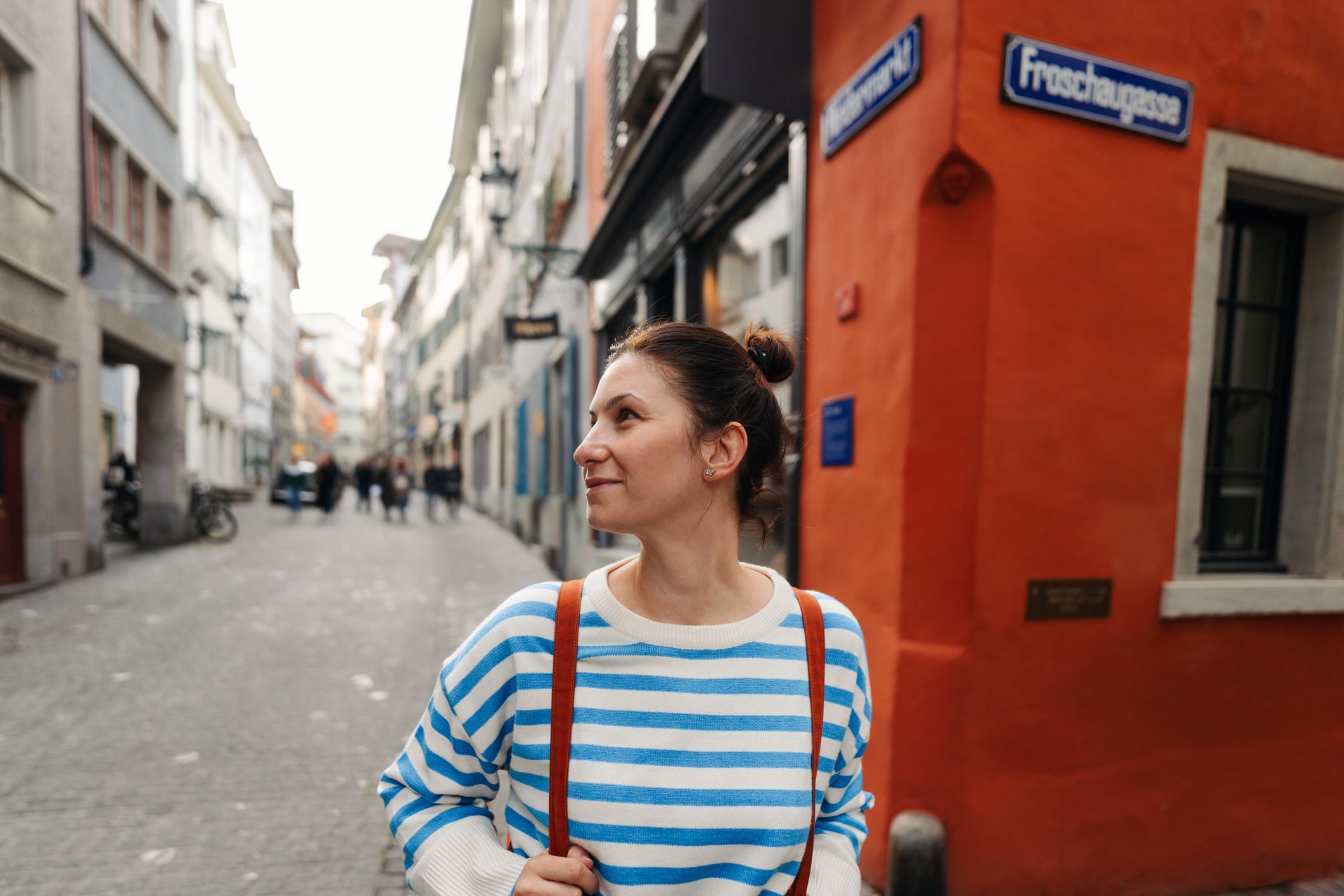 Female tourist discovering the new city
Photo of a woman walking the cobblestone streets and discovering sights of a new city in Europe
AleksandarNakic