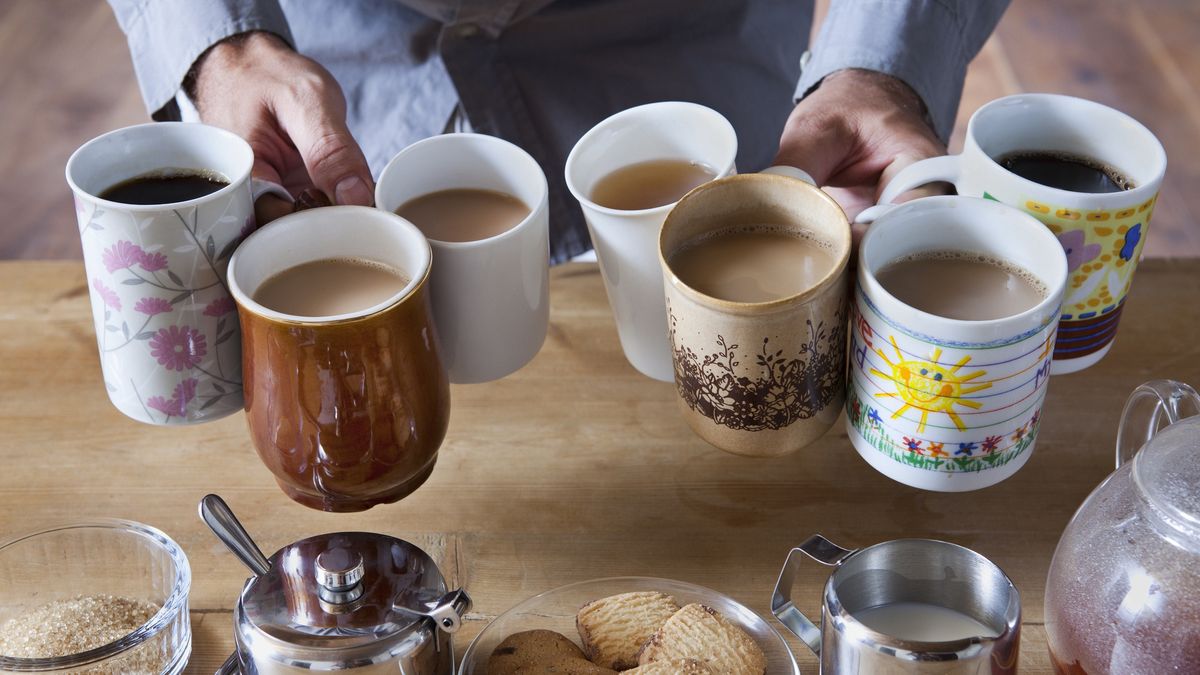 Man holding many tea and coffee cupsDimitri Otismeeting, office, choice, customization, selection