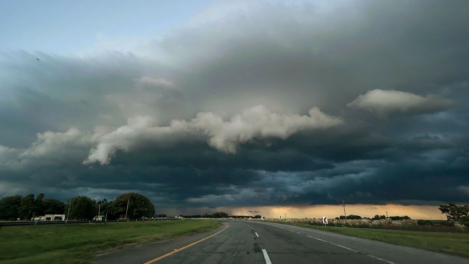 Temporary
Storm clouds are pictured on the road between Coronel Vidal and Mar del Plata, Buenos Aires province, Argentina on March 7, 2025. Six people died and hundreds were evacuated in the Argentine port city of Bahia Blanca as torrential rains flooded homes and hospitals, destroyed roads and forced authorities to cut the power. (Photo by PABLO PRESTI / AFP)
PABLO PRESTI
