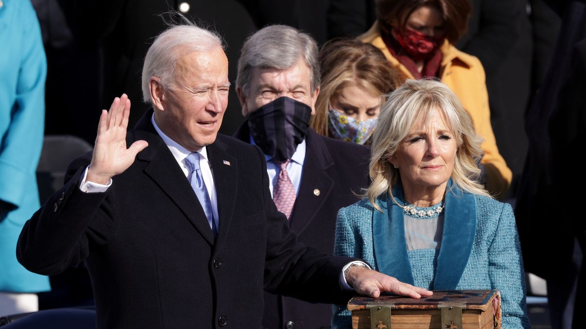 WASHINGTON, DC - JANUARY 20: Joe Biden is sworn in as U.S. President as his wife Dr. Jill Biden looks on during his inauguration on the West Front of the U.S. Capitol on January 20, 2021 in Washington, DC.  During today's inauguration ceremony Joe Biden becomes the 46th president of the United States. (Photo by Alex Wong/Getty Images)