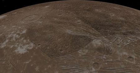 NASA pokazuje niewidziane wcześniej zdjęcia lodowego księżyca