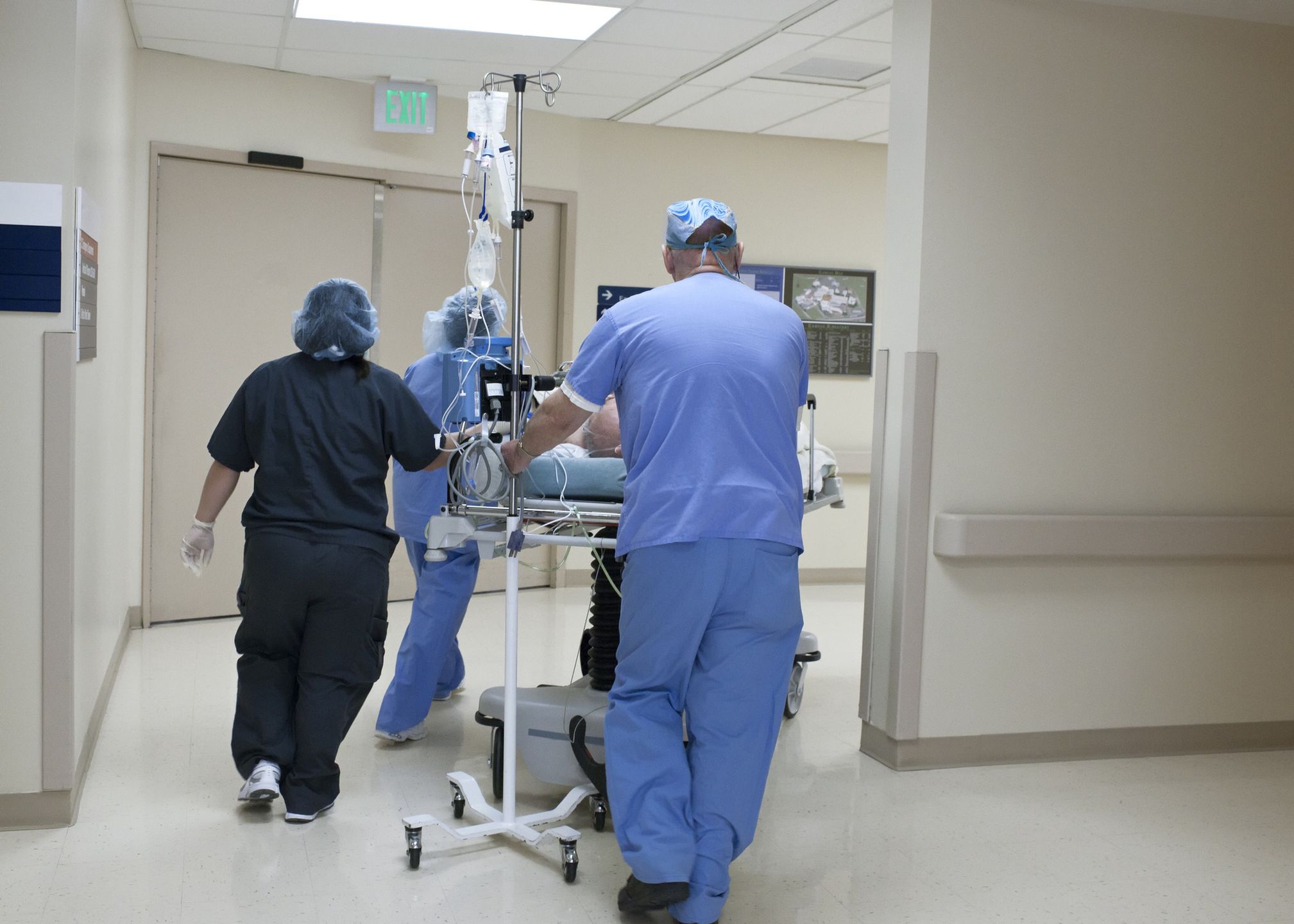Patient being rushed through hospital corridor
Reza Estakhrian
