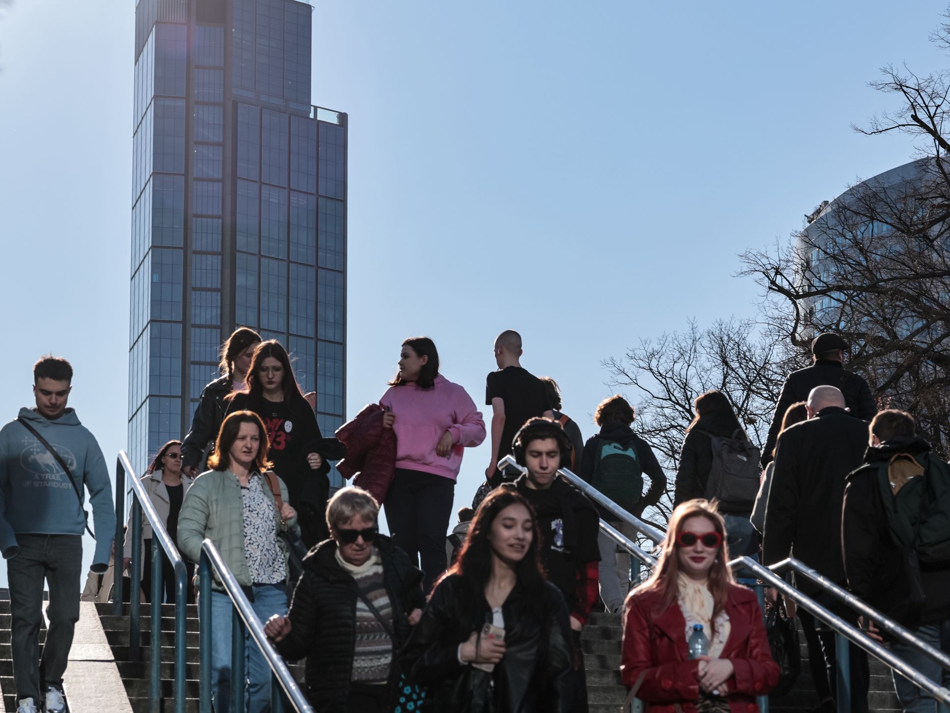 People walk on a high street in central Warsaw, the capital of Poland as Polish National Bank declares it will not lower country's high interest rates and national deficit turns out to be much higher than expected - April 3, 2025. (Photo by Dominika Zarzycka/NurPhoto via Getty Images)