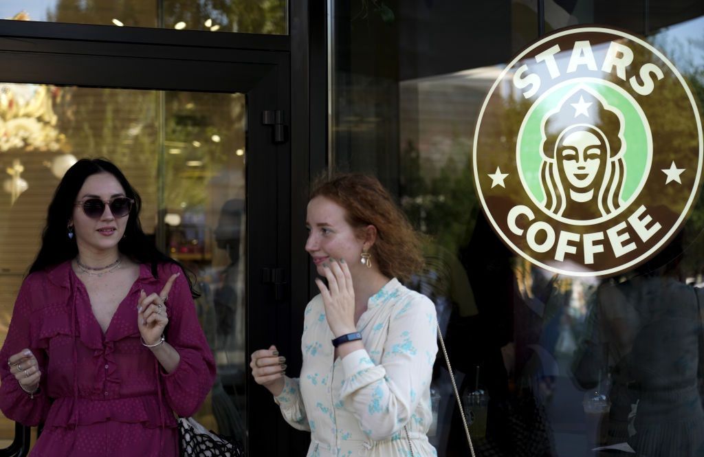 Former Starbucks coffee shops reopened as Stars Coffee in RussiaMOSCOW, RUSSIA - AUGUST 18: The Stars Coffee logo is seen on a window after former Starbucks coffee shops are reopened as Stars Coffee in Moscow, Russia on August 18, 2022. The rebranded coffee shops are owned by Russian businessman Anton Pinskiy and Russian rapper Timur Yunusov, known as Timati. Starbucks suspended its businesses in Russia in March, and pulled out of the country in May. (Photo by Pavel Pavlov/Anadolu Agency via Getty Images)Anadolu Agencymoscow, rebranded, russian rapper timur yunusov, stars coffee, timati