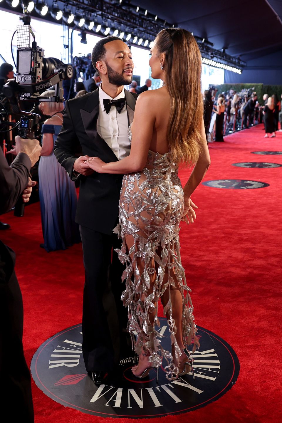 2024 Vanity Fair Oscar Party Hosted By Radhika Jones - Red CarpetBEVERLY HILLS, CALIFORNIA - MARCH 10: (L-R) John Legend and Chrissy Teigen attend the 2024 Vanity Fair Oscar Party Hosted By Radhika Jones at Wallis Annenberg Center for the Performing Arts on March 10, 2024 in Beverly Hills, California. (Photo by Cindy Ord/VF24/Getty Images for Vanity Fair)Cindy Ord/VF24