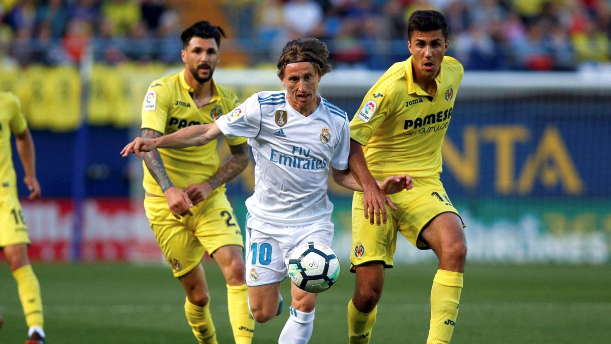 Luka Modrić (w środku) oraz Rodri (z prawej)