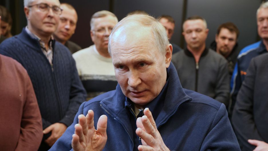 KAZAN, RUSSIA - FEBRUARY 22: (RUSSIA OUT) Russian President Vladimir Putin (C) gestures during his meeting with drivers and rpad industry representatives, on February 22, 2024 in Kazan, Russia. Putin is having a two day trip to Kazan prior the 2024 Presidential Elections, planned on March. (Photo by Contributor/Getty Images)