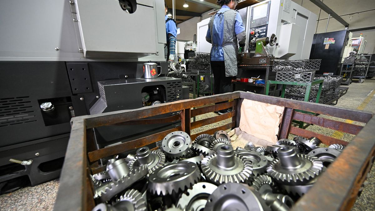TAIZHOU, CHINA - JULY 19, 2024 - A worker is producing gears at a workshop at a gear factory in Taizhou, Jiangsu province, China, July 19, 2024. To meet the needs of domestic auto manufacturers such as SAIC, BAIC, BYD and Great Wall. (Photo credit should read CFOTO/Future Publishing via Getty Images)