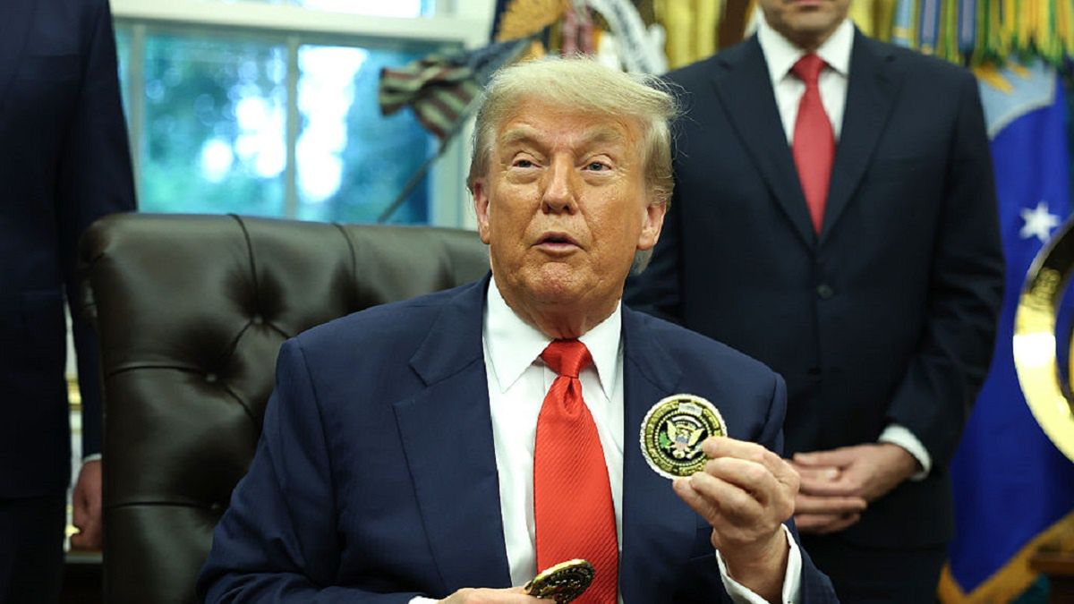 President Trump Meets With Foreign Ministers Of Rwanda And DDRC
WASHINGTON, DC - JUNE 27: U.S. President Donald Trump holds a coin as he delivers remarks while meeting with Minister of Foreign Affairs and Cooperation of Rwanda Olivier Nduhungirehe and the Foreign Minister of the Democratic Republic of the Congo Thérèse Kayikwamba Wagner in the Oval Office at the White House on June 27, 2025. The meeting took place as a peace agreement brokered by the White House, which hopes to end a conflict in eastern Democratic Republic of Congo, was signed by officials of the two African nations.  (Photo by Joe Raedle/Getty Images)
Joe Raedle