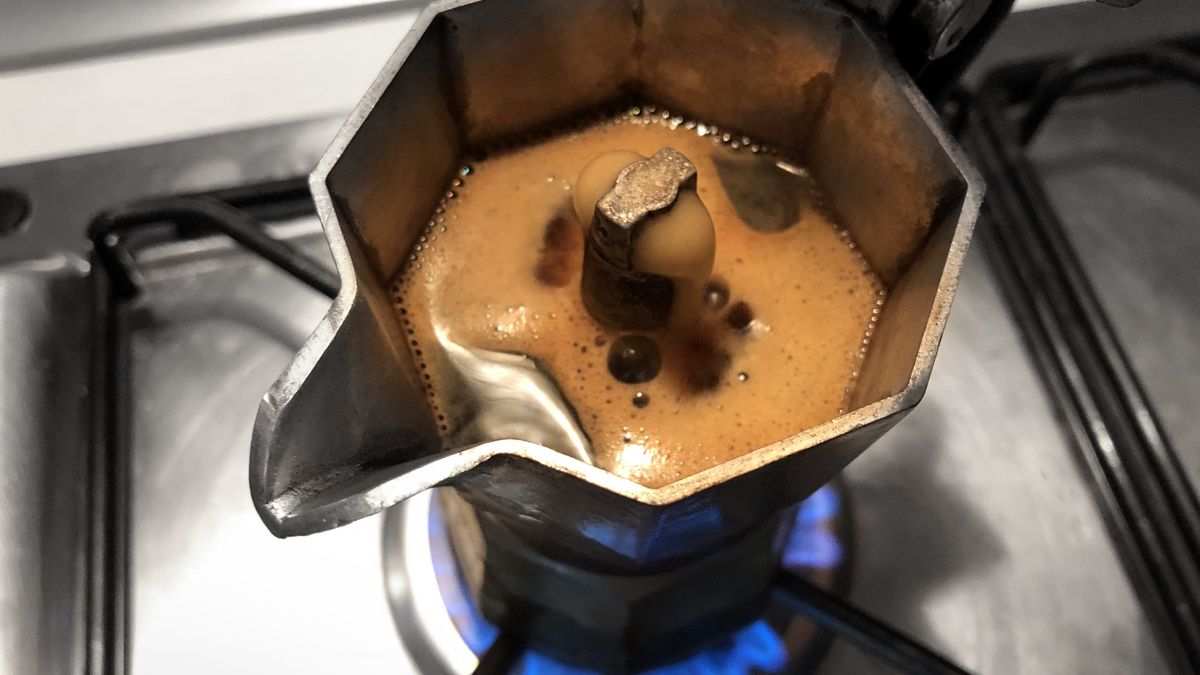 Moka with coffee on the stove top. Traditional italian coffee maker.Moka with coffee on the stove top. Traditional italian coffee maker.malerapaso