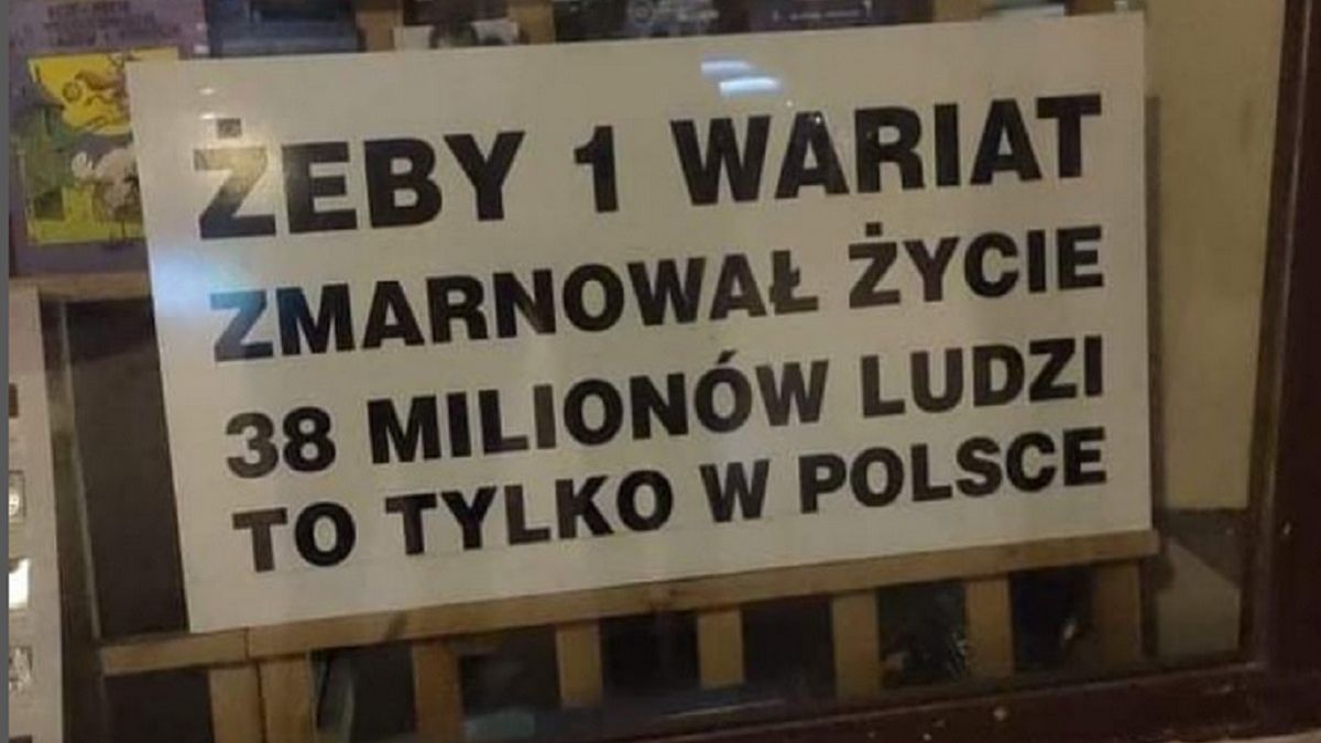 Tabliczka na szybie antykwariatu w Łodzi