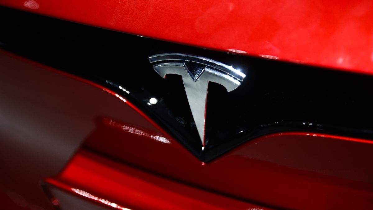 Tesla logo is seen on a car at the showroom in Santa Monica, United States on November 12, 2023. (Photo by Jakub Porzycki/NurPhoto via Getty Images)