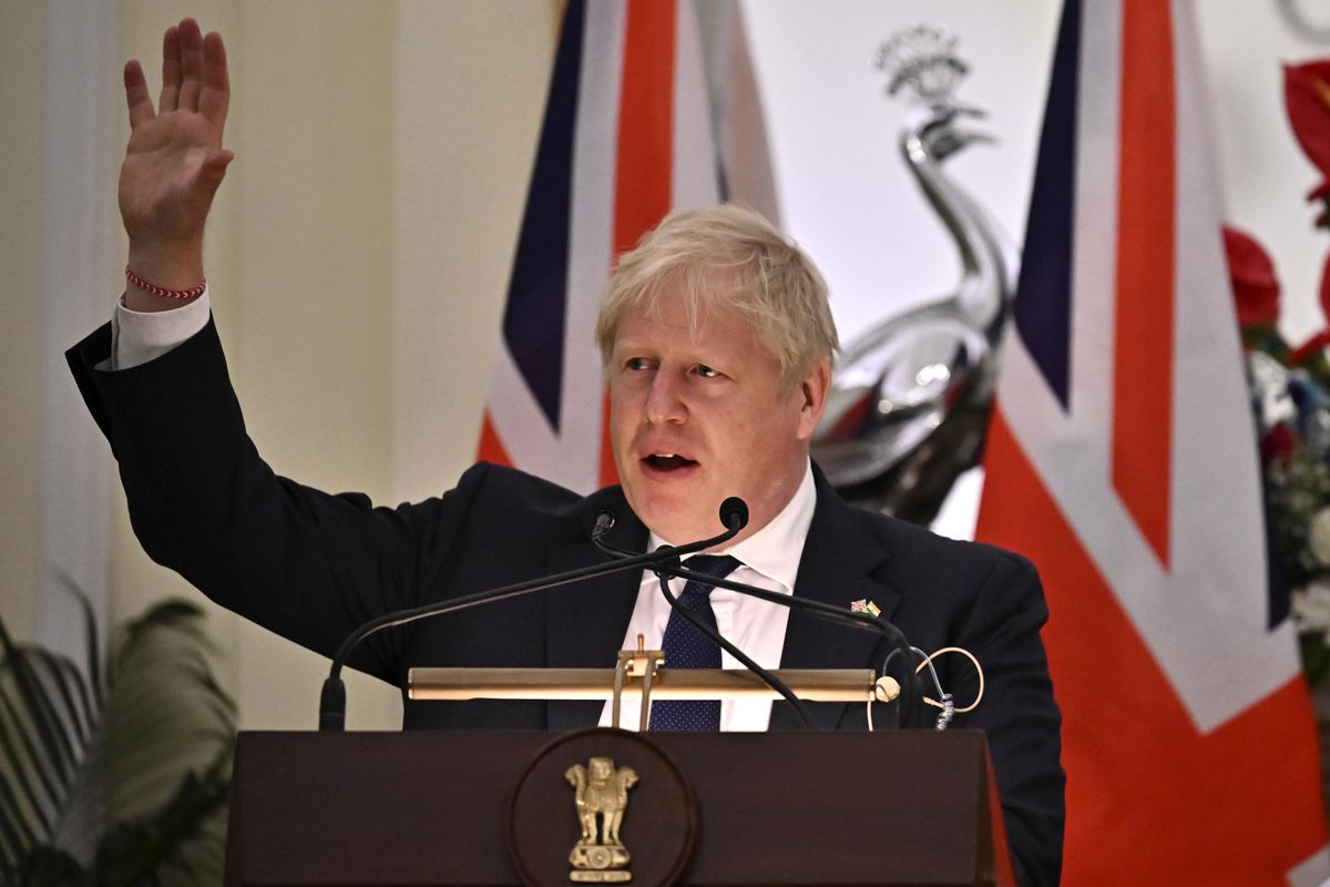 NEW DELHI, INDIA - APRIL 22: British Prime Minister Boris Johnson speaks during a joint press briefing with his Indian counterpart Narendra Modi (not pictured) at the Hyderabad House on April 22, 2022 in New Delhi, India. During his two-day visit to India, Boris Johnson is expecting to seal new collaborations on defence and green energy as he seeks to reduce the country's dependence on Russian fossil fuels and military equipment. (Photo by Ben Stansall - WPA Pool/Getty Images)