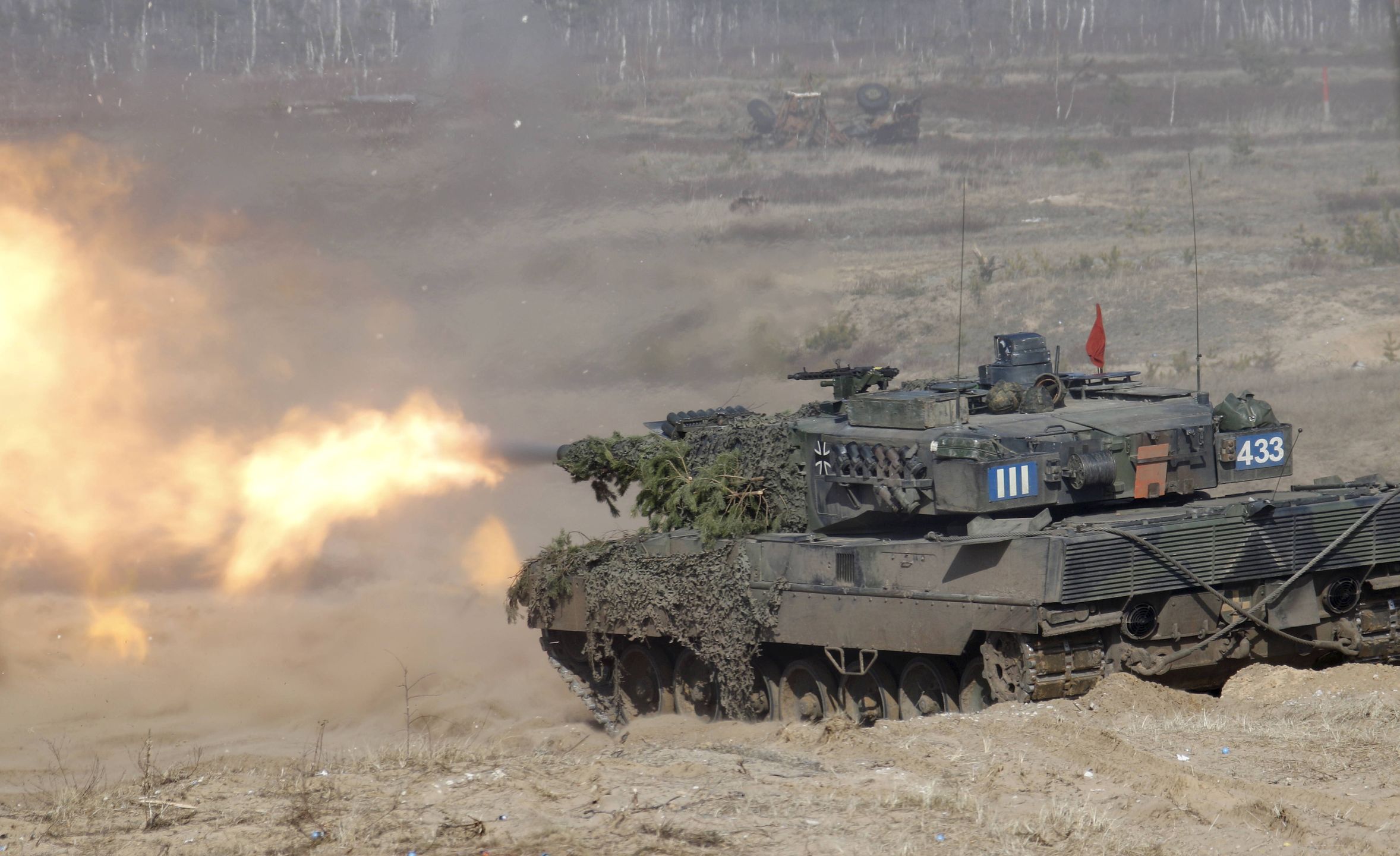 NATO international military exercise Crystal Arrow 2021
epa09099837 German soldiers of the NATO Extended Presence Battlegroup with their battle tank  Leopard 2 participiates in the military exercise Crystal Arrow 2021 in Adazi Militari base, Latvia, 26 March 2021. From March 15 to 26, the international military exercise Crystal Arrow 2021 takes place at and around the Adazi landfill. The aim of the training is to improve the co-operation and interoperability of units in the performance of common tasks, including the simultaneous execution of defense, deterrence and attack operations, as well as the certification of the NATO Extended Presence Battlegroup in Latvia. Approximately 1,700 troops from Albania, the United States, the Czech Republic, Italy, Canada, Latvia, Lithuania, Montenegro, Poland, Slovakia, Slovenia, Spain and Germany will take part in the exercise.  EPA/VALDA KALNINA 
Dostawca: PAP/EPA.
VALDA KALNINA