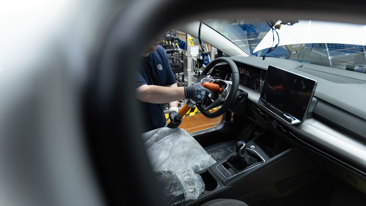 The interior of a VW Golf on the assembly line at the Volkswagen AG factory in Wolfsburg, Germany, on Thursday, May 23, 2024. Auto sales in Europe rose 12% in April as manufacturers including Volkswagen AG and Renault SA benefited from robust demand for plug-in and conventional cars in several major markets. Photographer: Krisztian Bocsi/Bloomberg via Getty Images
