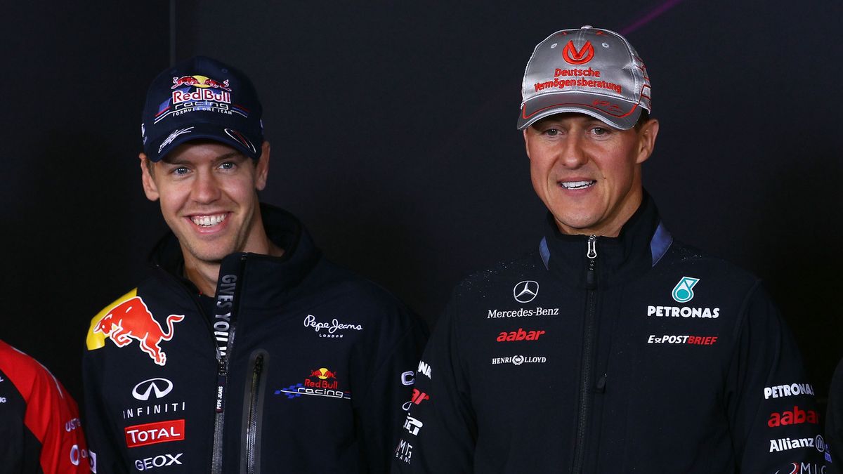 Sebastian Vettel (z lewej) i Michael Schumacher