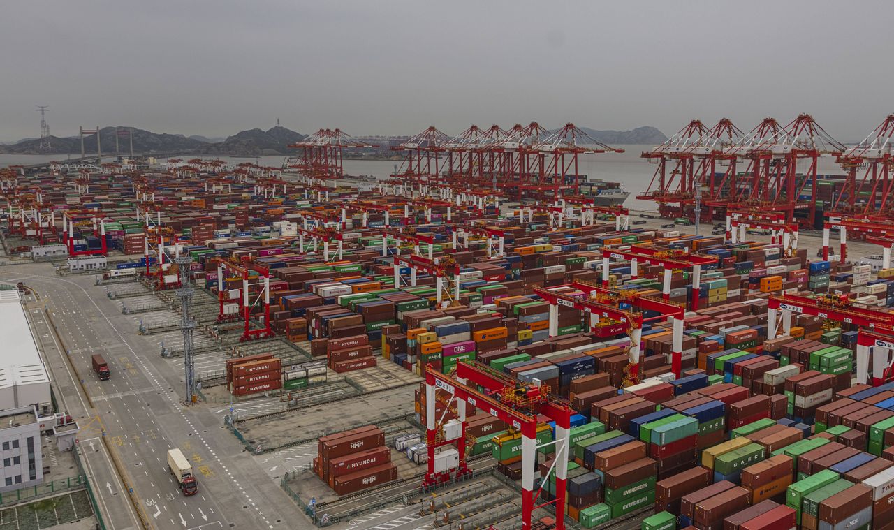 Shanghai terminal. Record trade surplus for China in 2024.