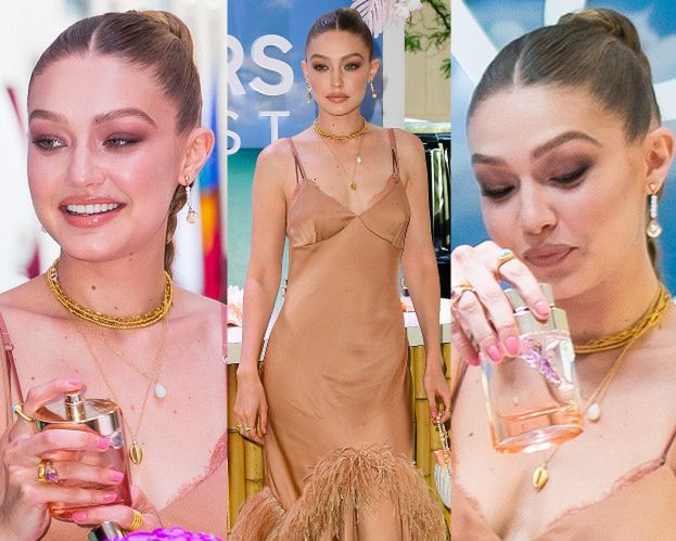 Wypindrzona Gigi Hadid dorabia na straganie z flakonami. Wygląda inaczej? (ZDJĘCIA)