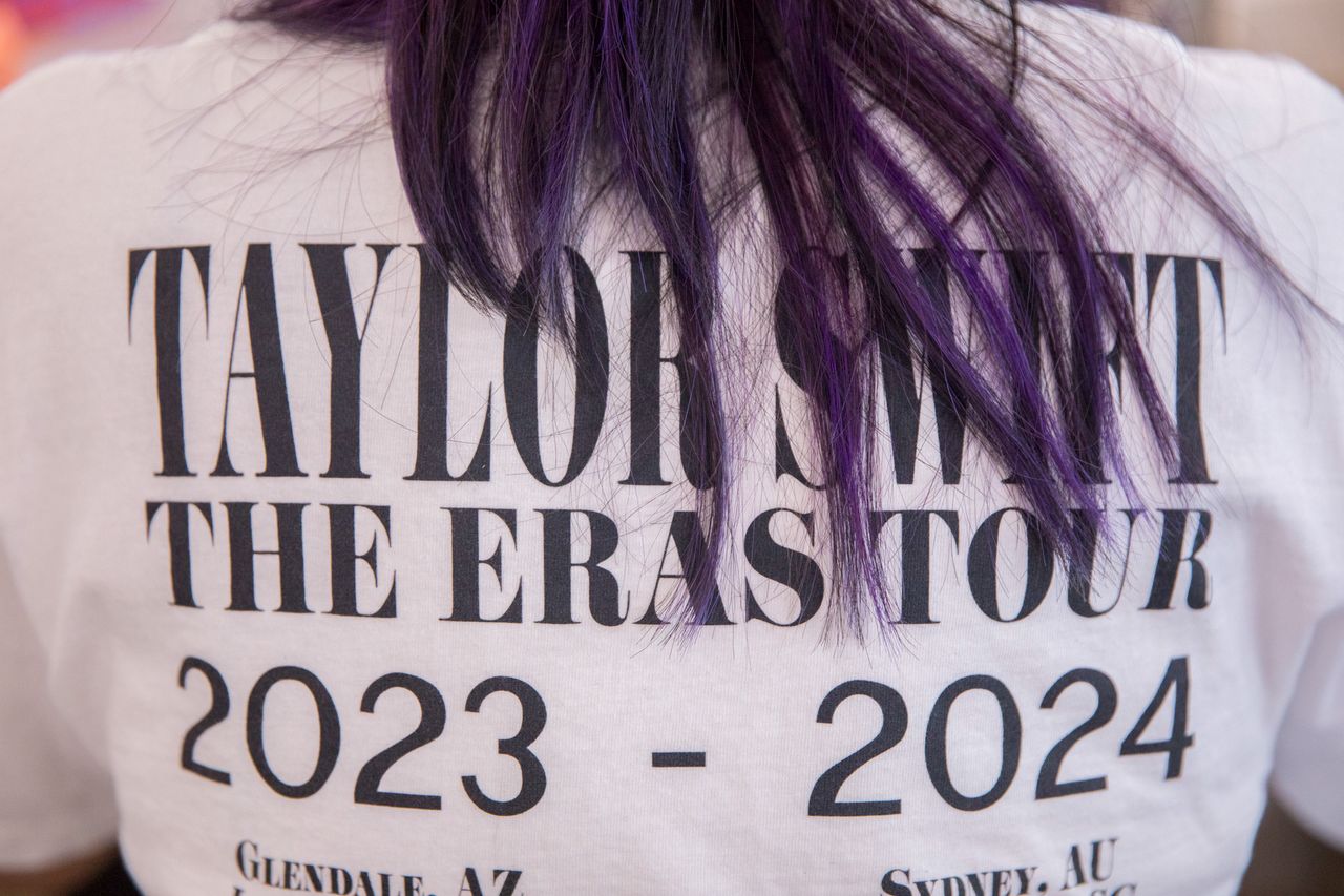 An employee wears a Taylor Swift concert shirt at the headquarters of Canva Inc., in Sydney, Australia, on Tuesday, Sept. 17, 2024. To earn a bigger slice of the $15.4 billion creative software market, Canva is focusing on the high-margin enterprise market currently dominated by Adobe. Photographer: Brent Lewin/Bloomberg via Getty Images