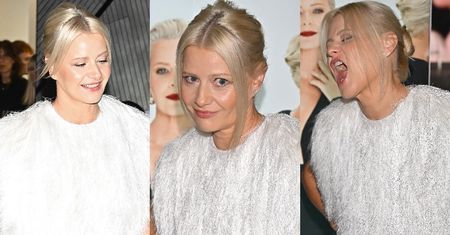 Wystrojona w biel Małgorzata Kożuchowska stroi miny na evencie