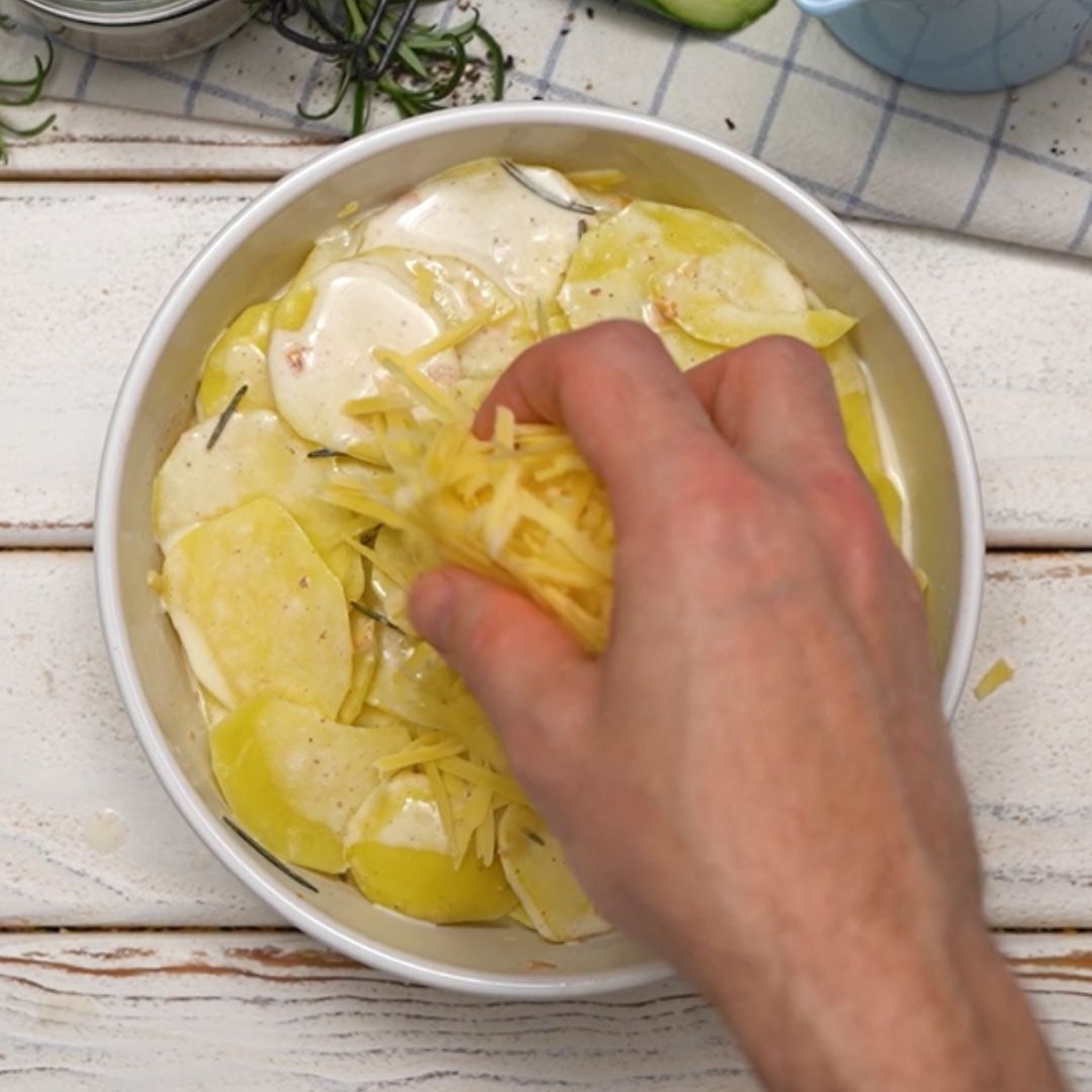 A little more cheese and the dish will go into the oven.