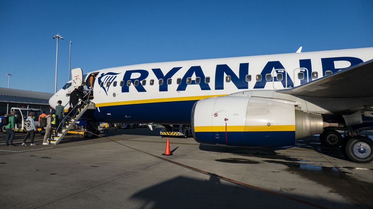 Passengers waiting in line and boarding a Ryanair low cost airline airplane at London Stansted Airport in the UK. The Boeing 737-800 passenger aircraft of the budget carrier has the registration tail number EI-ENF. Ryanair is an Irish Ultra Low-cost carrier group with headquarters in Dublin, Ireland with a fleet of 607 planes. Stansted Airport is the tertiary international airport serving London, the capital of England and the United Kingdom, fourth busiest in the UK owned by Manchester Airports Group. Stansted, United Kingdom on October 11, 2024 (Photo by Nicolas Economou/NurPhoto via Getty Images)