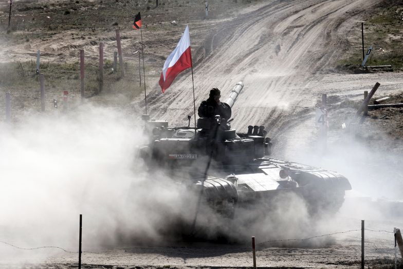 Polish soldiers in a tank participate in the Canadian Army Trophy (CAT) tank competition at Adazi Military Base, Latvia, 03 May 2024. The 'CAT 24' competition was held this year with crews from tank and combat vehicle units of Italy, Canada, Great Britain, Norway, Poland, Spain, and Germany. The exerciseĂ�aimed to work on unit tactics, techniques, and procedures, as well as sharing experiences to strengthen the integration and firepower of NATO allies. The competition was previously part of the 'Iron Spear' military exercise but has now regained its historical name. The winners of the competition will be awarded a special trophy. Canada leads NATO's extended presence battle group in Latvia, which currently consists of more than 1,900 soldiers from Albania, Canada, the Czech Republic, Iceland, Italy, Montenegro, North Macedonia, Poland, Slovakia, Slovenia, and Spain who serve alongside domestic armed forces on a rotating basis. EPA/VALDA KALNINA Dostawca: PAP/EPA.