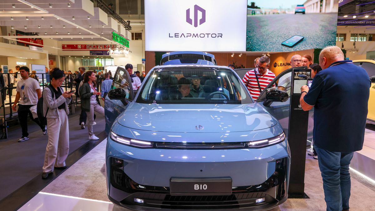 Visitors at the Leapmotors stand at the summit area on the opening day of the IAA Mobility 2025 expo in Munich, Germany, on Tuesday, Sept. 9, 2025. The Munich car show is taking place as trade tensions linger with Beijing following the European Unions decision last year to impose tariffs on EVs imported from China. Photographer: Alex Kraus/Bloomberg via Getty Images