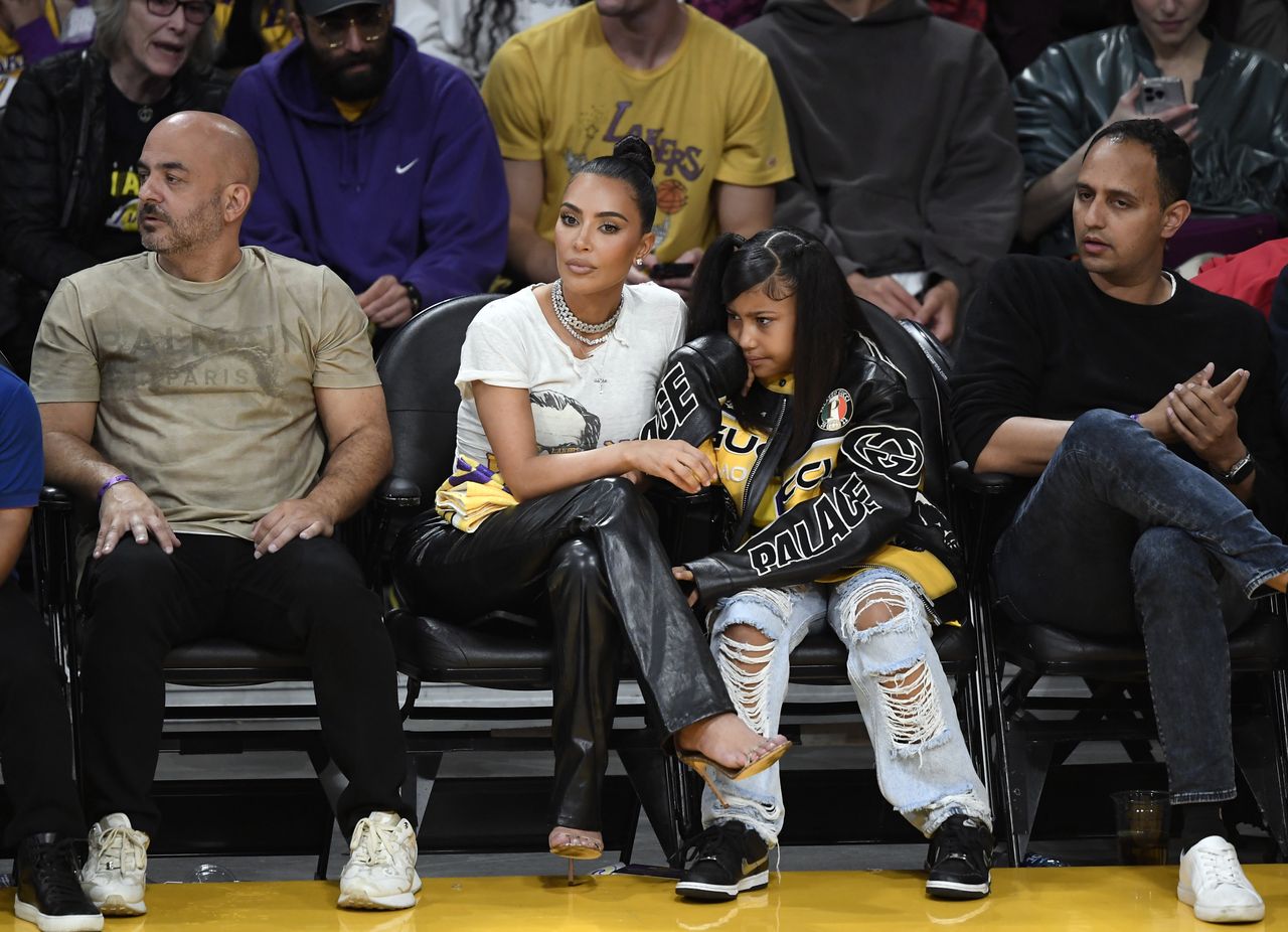 LOS ANGELES, CALIFORNIA - MAY 12: Kim Kardashian and daughter North West attend the Western Conference Semifinal Playoff game between the Los Angeles Lakers and Golden State Warriors at Crypto.com Arena on May 12, 2023 in Los Angeles, California. (Photo by Kevork Djansezian/Getty Images)