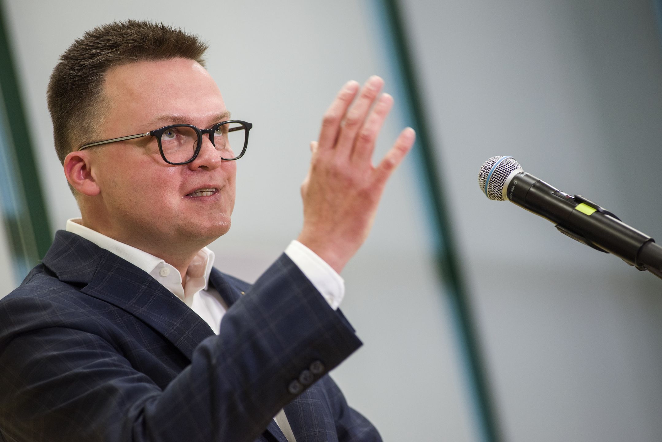 WARSAW, POLAND - 2021/12/04: Szymon Holownia, leader of the Poland 2050 political party, speaks during the forum titled the "Plan for the Economy".
A forum of the movement and political party Poland 2050 (Polska 2050, entitled "Plan for the Economy" (Plan dla Gospodarki), was held in Warsaw. Szymon Holownia, president of the Poland 2050 introduced the party's plan to rebuild the Polish economy. (Photo by Attila Husejnow/SOPA Images/LightRocket via Getty Images)