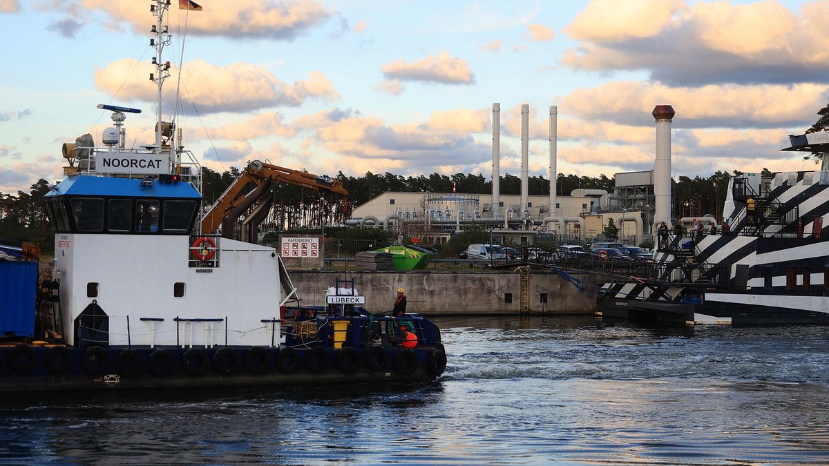 The Noorcat inland utility vessel passes the gas receiving compressor station of the Nord Stream 1 natural gas pipeline in Lubmin, Germany, on Tuesday, Aug 30, 2022. A three-day halt of the Nord Stream pipeline -- a key source of natural gas for the European Union -- started on Wednesday, and concerns are widespread that Moscow will find another excuse to clamp down on supplies, putting the region at the mercy of the weather. Photographer: Krisztian Bocsi/Bloomberg via Getty Images