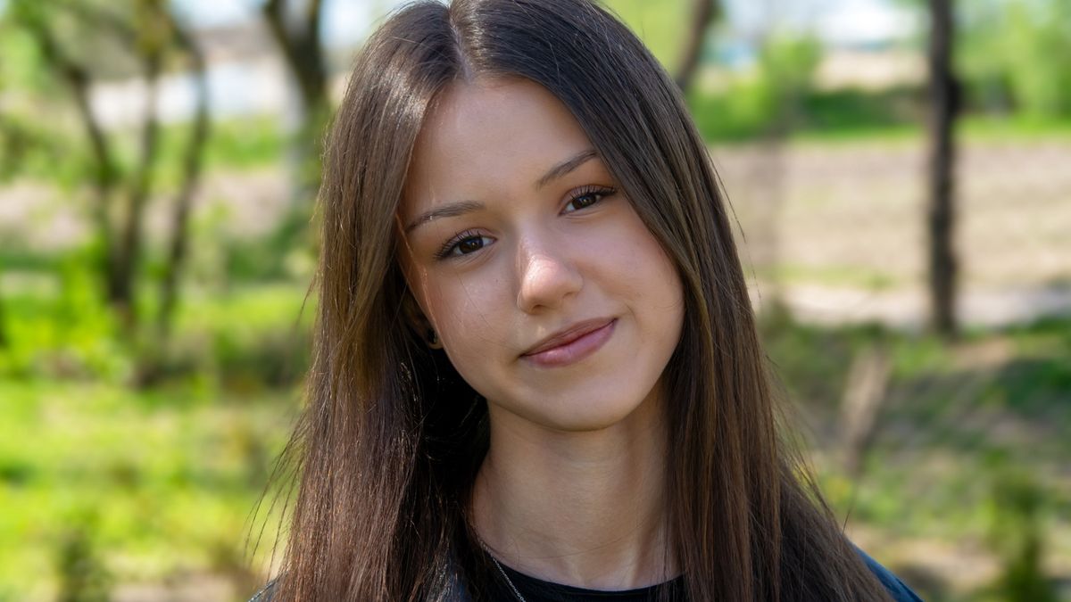 Beautiful teenage girl, portrait on the street outside the city.Beautiful teenage girl, portrait on the street outside the city.Ivan Zatirka