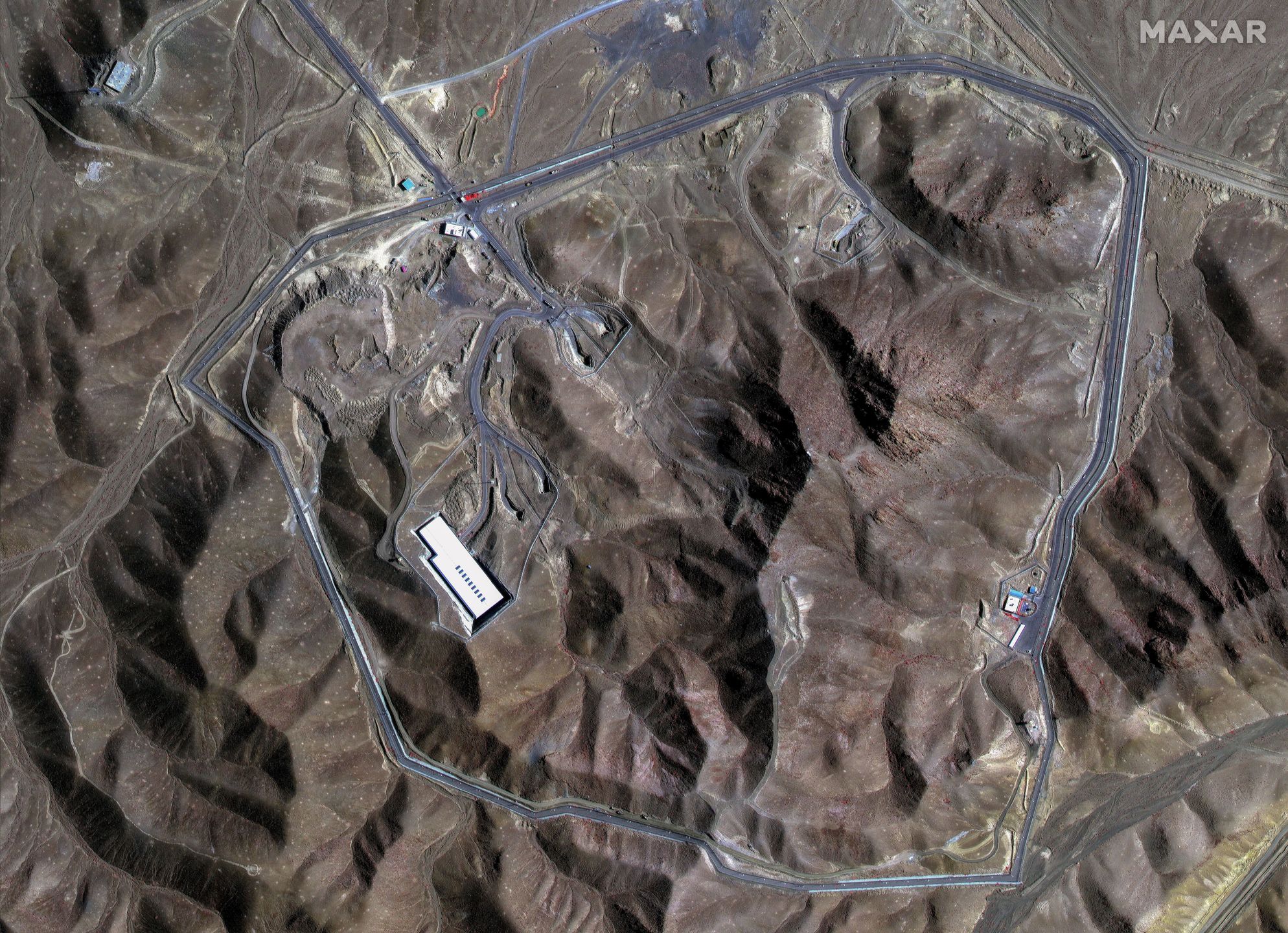 A handout satellite image made available by Maxar Technologies shows an overview of the Fordo underground uranium enrichment facility before the US airstrikes, in Iran, 20 June 2025 (issued 22 June 2025). The US forces struck three of Iran's key nuclear sites: Natanz, Isfahan and Fordo (Fordow), US President Trump announced on 21 June. EPA/MAXAR TECHNOLOGIES HANDOUT MANDATORY CREDIT: SATELLITE IMAGE 2025 MAXAR TECHNOLOGIES -- THE WATERMARK MAY NOT BE REMOVED/CROPPEDHANDOUT EDITORIAL USE ONLY/NO SALES Dostawca: PAP/EPA.