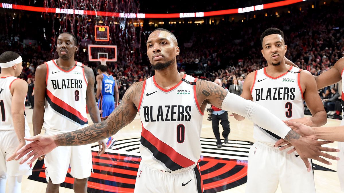 Getty Images / Steve Dykes / Na zdjęciu: Damian Lillard (w środku)
