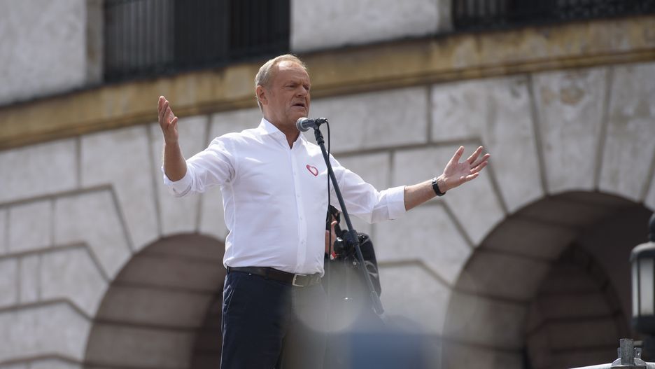 Poland's Prime Minister Donald Tusk speaks to the crowd during the "Patriots march" as he supports Warsaw's mayor and presidential candidate Rafal Trzaskowski, Sunday, May 25, 2025 in Warsaw, Poland. Several Thousands of people marched with the candidate for President of Poland in a rally aimed to mobilise voters ahead of the run-off election round that will take place on June 1, 2025 in which the the centrist Warsaw mayor Rafa Trzaskowski, from prime minister Donald Tusk's governing pro-European coalition will face the Eurosceptic historian Karol Nawrocki, backed by the populist rightwing Law and Justice party (PiS).