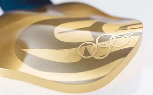 Co medale olimpijskie na 2010 rok mają wspólnego z gadżetami? 1