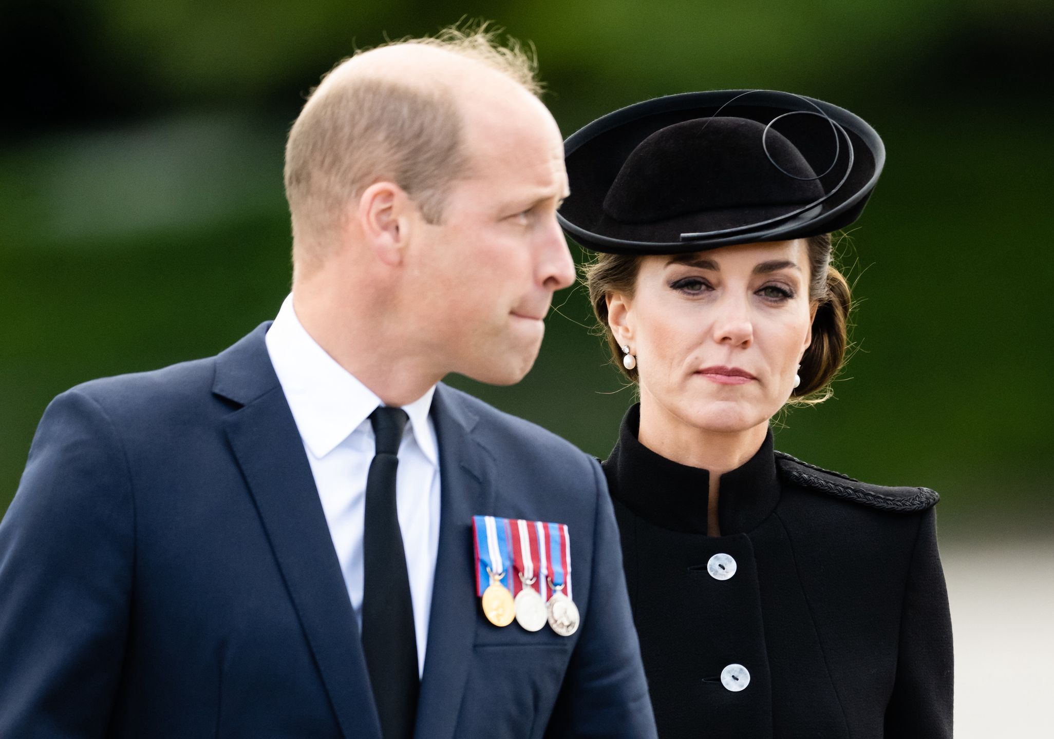 The Prince And Princess Of Wales Visit ATC PirbrightGUILDFORD, ENGLAND - SEPTEMBER 16: Catherine, Princess of Wales and Prince William, Prince of Wales meet with military personnel during a visit to Army Training Centre Pirbright on September 16, 2022 in Guildford, England. The Prince and Princess of Wales are visiting the training centre to meet troops from the Commonwealth who have been deployed to the UK in order to take part in the funeral of Queen Elizabeth II, which will take place on September 19. (Photo by Samir Hussein/WireImage)Samir Hussein