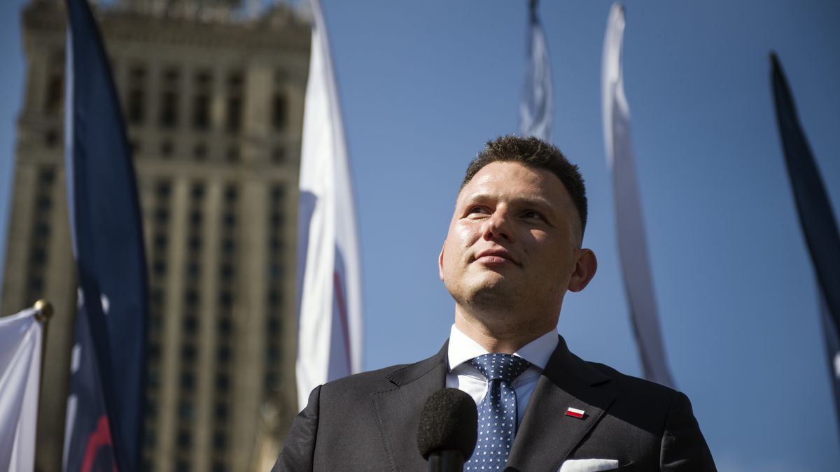 WARSAW, MASOVIAN VOIVODESHIP, POLAND - 2025/05/13: Slawomir Mentzen far-right presidential candidate, speaks during his rally in Warsaw ahead of the upcoming presidential election. Polish far-right presidential candidate Slawomir Mentzen held a meeting with his supporters in the center of Warsaw as part of his campaign rally ahead of the presidential elections scheduled for 18 May 2025.
Slawomir Mentzen, member of the Confederation (Konfederacja) political party has emerged as a prominent figure in Poland's presidential race, leveraging his savvy use of social media platforms like TikTok to connect with younger voters.
His sleek videos and populist messaging have resonated with many young people, especially men, propelling his visibility nationwide. Beyond the digital realm, Mentzen has been actively touring the country, aiming to broaden his appeal to older demographics. 
He is currently in third place in the polls in the upcoming first round of the presidential elections, which will be held on May 18, 2025, and is thus chasing second place to Karol Nawrocki - the candidate supported by Law and Justice. (Photo by Attila Husejnow/SOPA Images/LightRocket via Getty Images)