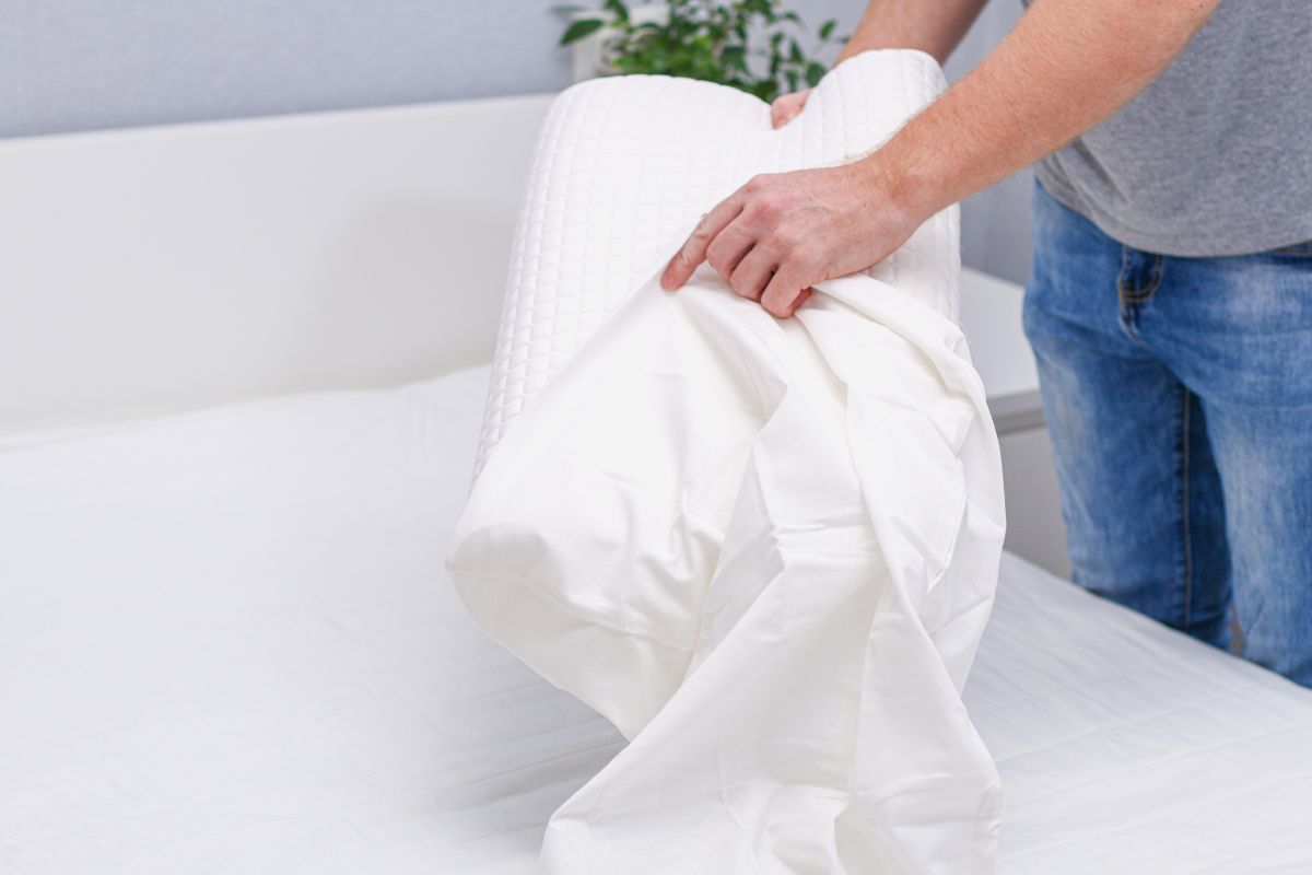 Changing the pillowcase.