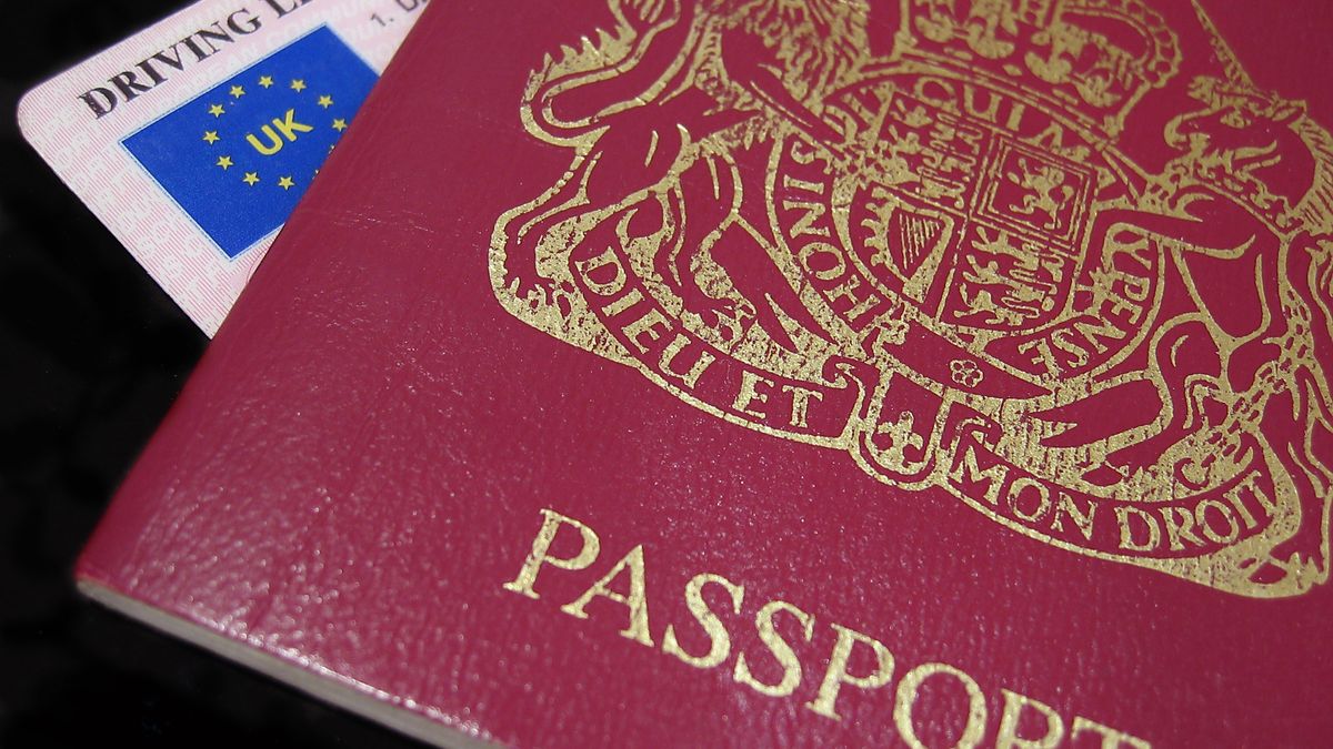 UK Passport and drivers licnense in close-up against a dark background
passport, travel, holiday, document, identity, id, license, driver, uk, england, check, control, law, government