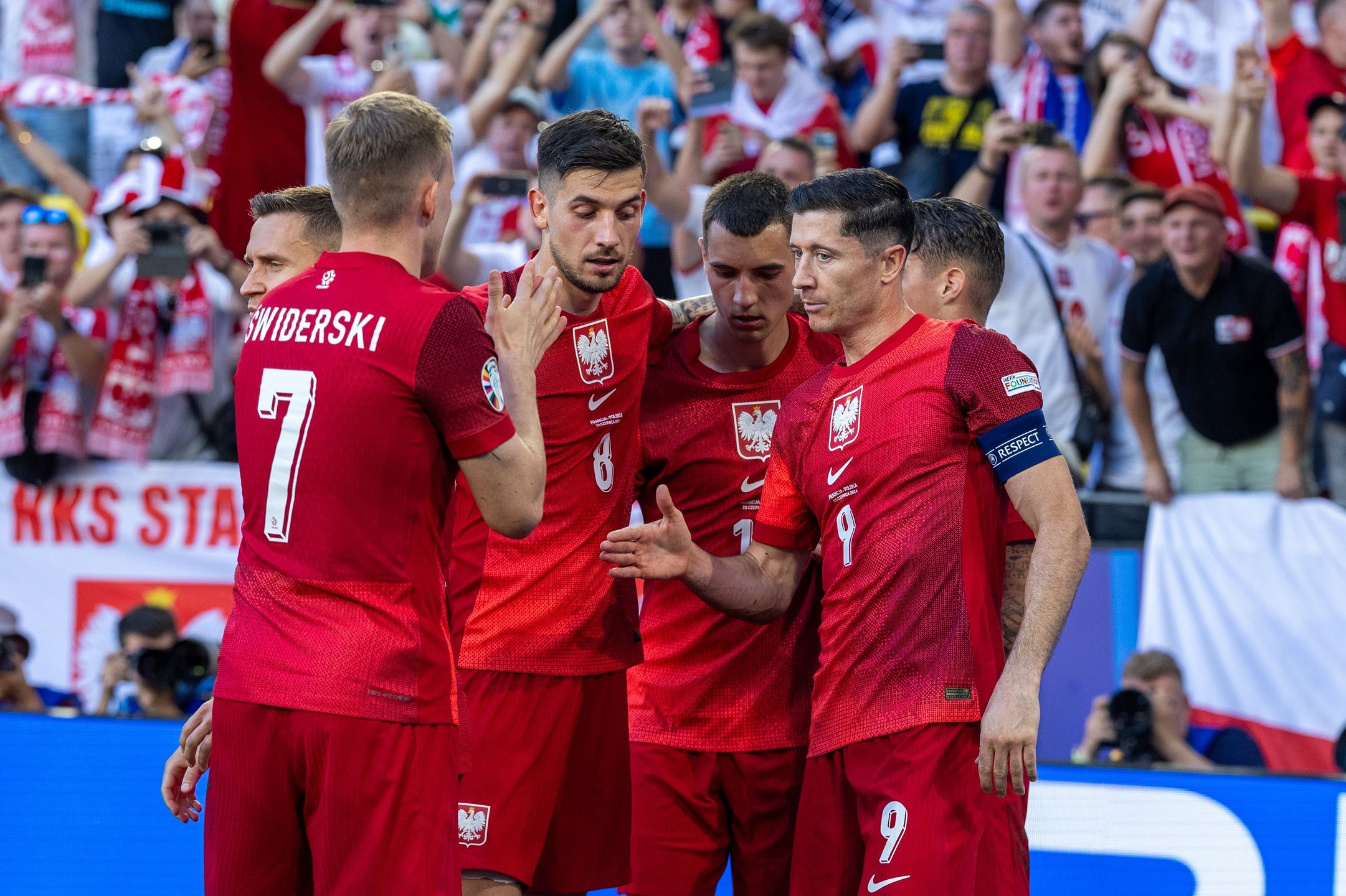 France v Poland - UEFA EURO 2024
Karol Swiderskii, Jakub Moder  Jakub Kiwior and Robert Lewandowskiare celebrating scoring a goal during the UEFA Euro 2024 Group D match between France v Poland, at the  BVB Stadion Dortmund in Dortmund, Germany, on June 25, 2024. (Photo by Andrzej Iwanczuk/NurPhoto via Getty Images)
NurPhoto
uefa competition, football, group stage, dortmund, nurphoto, dortmund match, team poland, teams, bvb stadion dortmund, andrzej iwanczuk, football stadium, team france, goal celebration, june 25, international competition, european championship, polish players, uefa euro 2024, euro 2024 qualifiers, players, european competition, uefa, france vs poland, european football., sporting event, tournament, french team, karol swiderski, matchday, football match