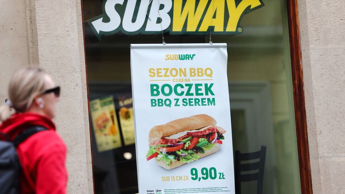 A person passes by Subway restaurant in Krakow, Poland, on May 30, 2022. (Photo by Jakub Porzycki/NurPhoto via Getty Images)